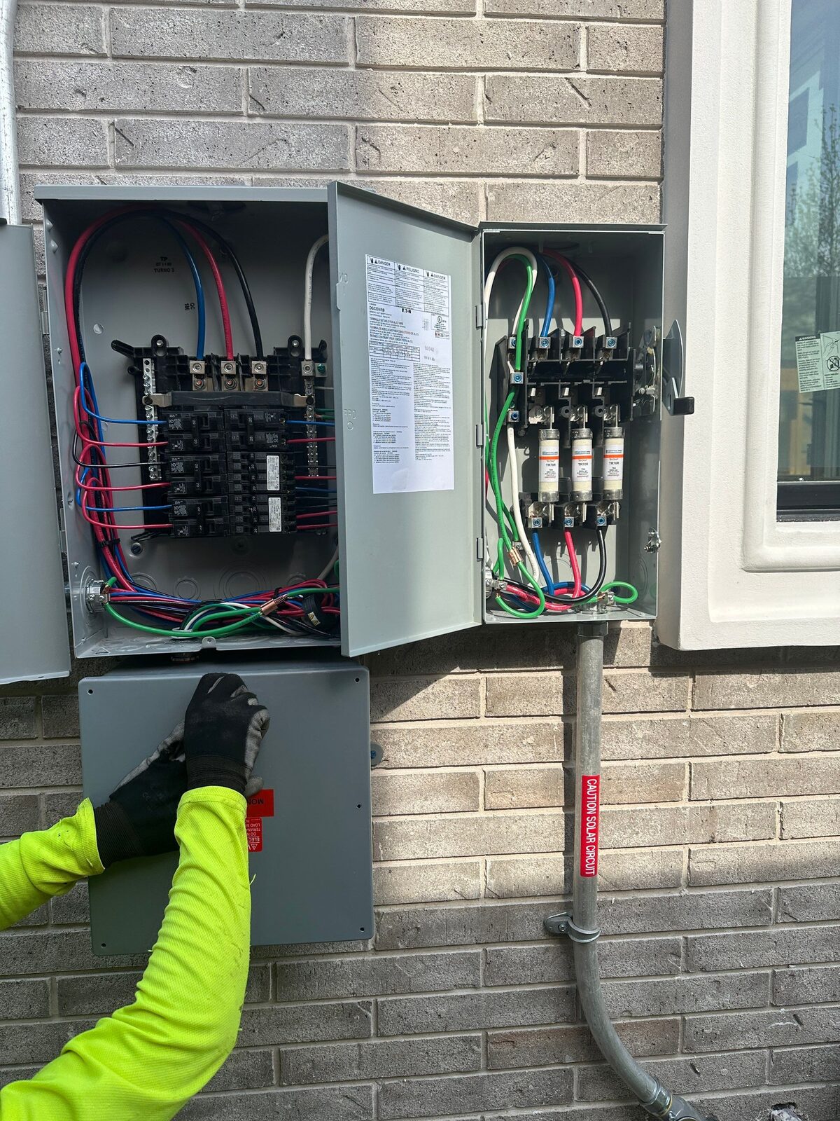 Tidy, labeled electrical wiring on a solar install